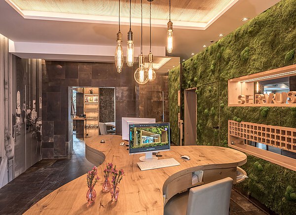 Leather tiles, real moss wall, reception area of the Bavaria Boutique Hotel Munich, photo: Bavaria Boutique Hotel